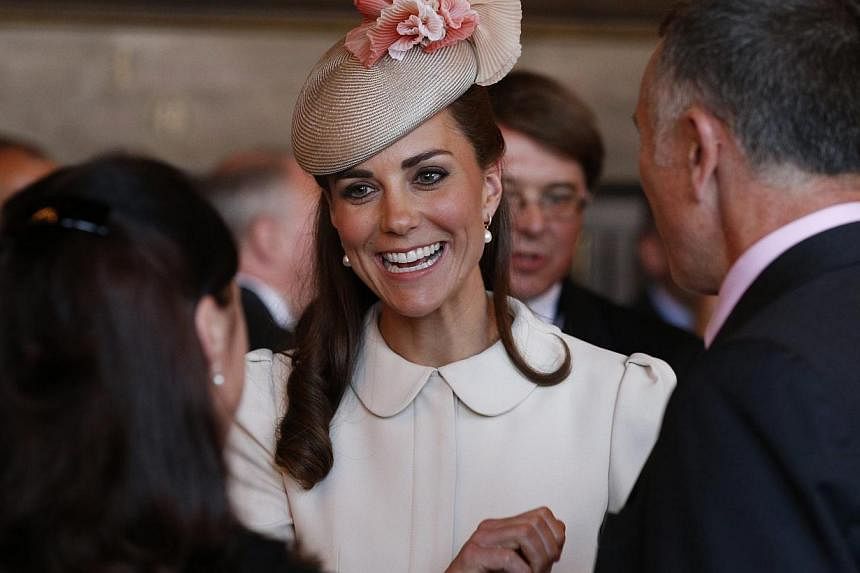 Catherine, Duchess of Cambridge attends a reception at the town hall in Mons on Aug 4, 2014. -- PHOTO: REUTERS