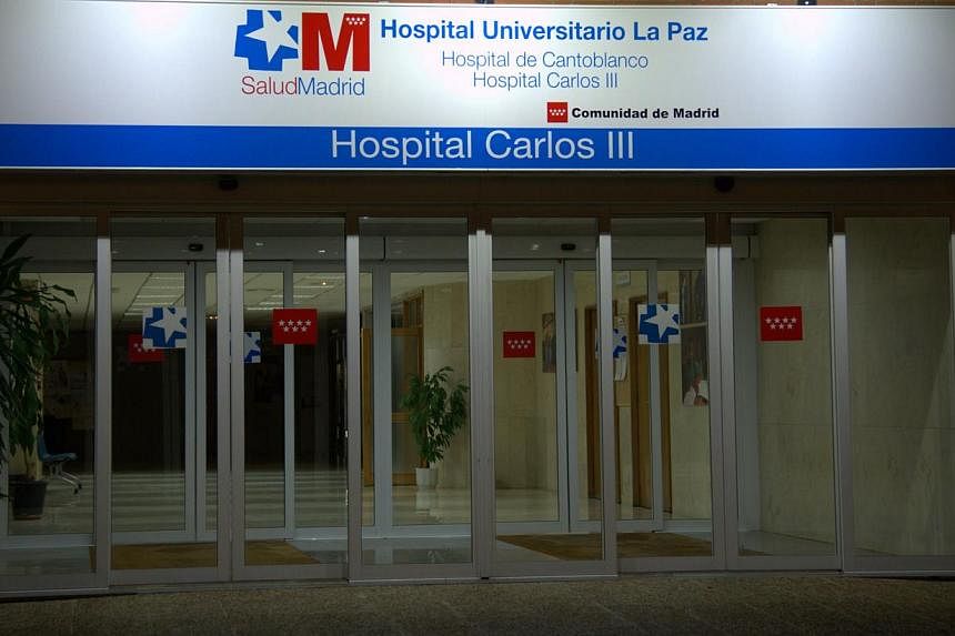 The front entrance to the Carlos III hospital is pictured in Madrid on Oct 8, 2014 where eight people are in quarantine as a precaution following the admission of Spanish nurse Teresa Romero infected with the ebola virus. -- PHOTO: AFP
