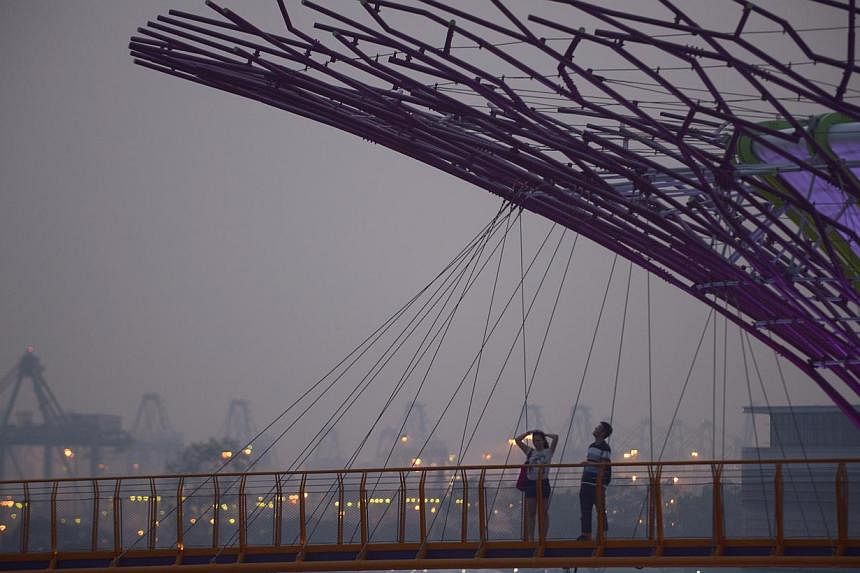 Air quality in Singapore hit unhealthy levels again on Saturday night. This file photo was taken on Oct 8, 2014. -- ST FILE PHOTO: MARK CHEONG