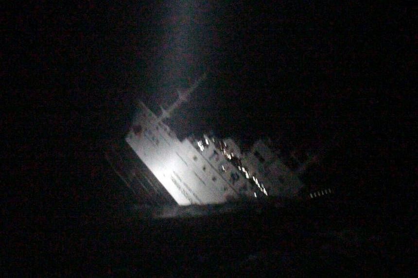 A video-grabbed image released by Taiwan's Coast Guard on Oct 11, 2014, shows the sinking marine research ship in the waters near the Penghu islands.&nbsp;-- PHOTO:&nbsp;AFP/TAIWAN COAST GUARD