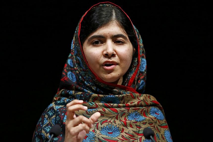Pakistani schoolgirl Malala Yousafzai, the joint winner of the Nobel Peace Prize, speaks at Birmingham library in Birmingham, central England Oct 10, 2014.&nbsp;She&nbsp;said she was "honoured" to be the first Pakistani and the youngest person to be 