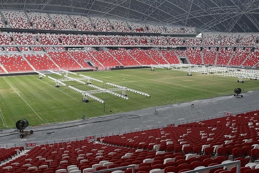 The new National Stadium will have its first sell-out crowd when five-time football world champions Brazil take on Japan in their friendly match on Tuesday. -- ST PHOTO:&nbsp;SEAH KWANG PENG