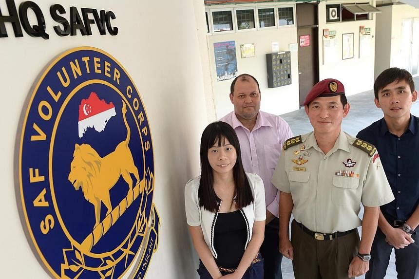 (From left) Singaporean Kweh Ting Ting, 27, Mr Calven Bland, 42, a New Zealand-born PR, Colonel Mike Tan, the appointed commander of the Singapore Armed Forces Volunteer Corps, and Mr&nbsp;Wong Weng Joon, 29, a Malaysia-born PR. Those who sign up for