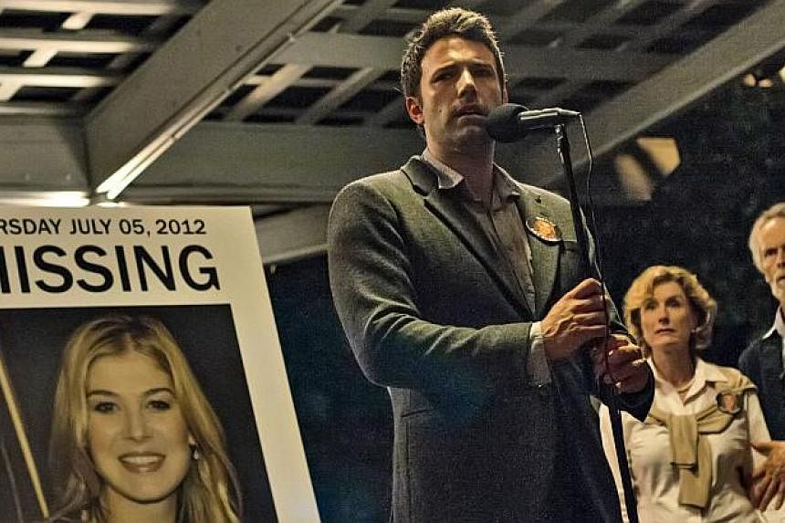 A cinema still from the movie Gone Girl starring Ben Affleck as a writer who becomes the prime suspect when his wife, played by Rosamund Pike, goes missing.--PHOTO: TWENTIETH CENTURY FOX&nbsp;