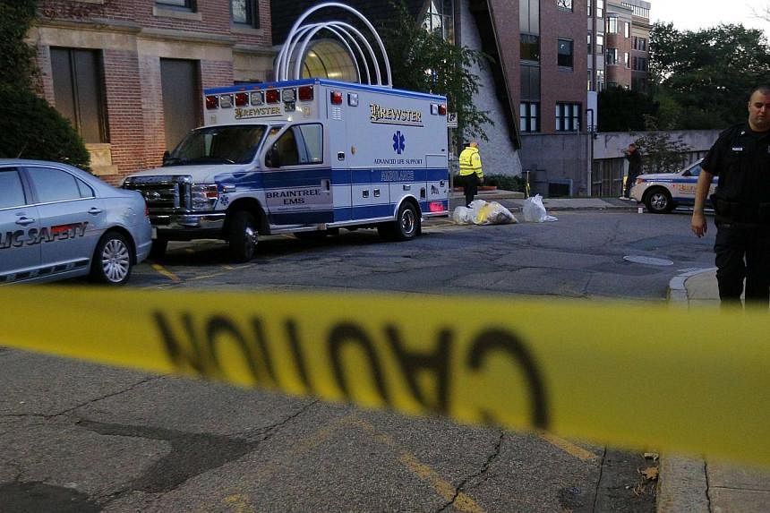 The ambulance used to transport a patient from Liberia with possible Ebola symptoms is parked outside the Beth Israel Deaconess Medical Center in Boston, Massachusetts on October 12, 2014. Doctors said on Monday that the patient did not have Ebola. -