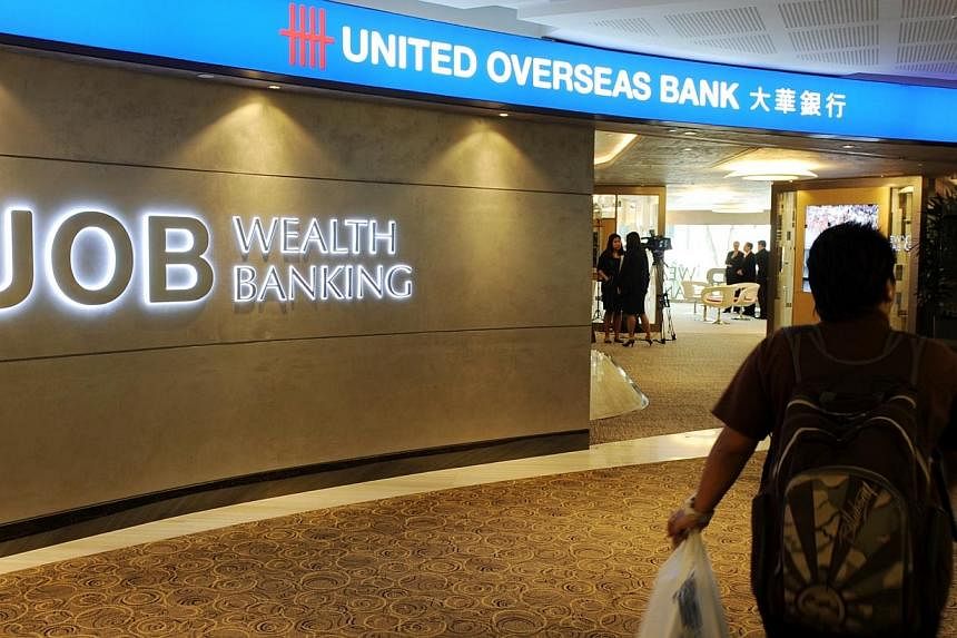 United Overseas Bank (UOB) has launched a new investment tool in a bid to get more customers to invest instead of leaving their money in deposit accounts. -- PHOTO: ST FILE