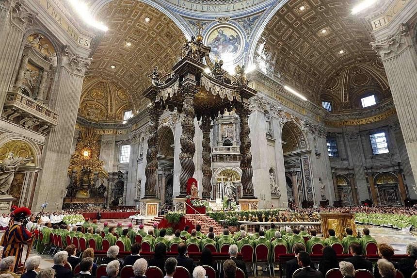 Pope Francis leads a thanksgiving mass for Canadian Saints in St. Peter's Basilica at the Vatican, Oct 12, 2014.&nbsp;In a dramatic shift in tone, a Vatican document said on Monday that homosexuals had"gifts and qualities to offer" and asked if Catho