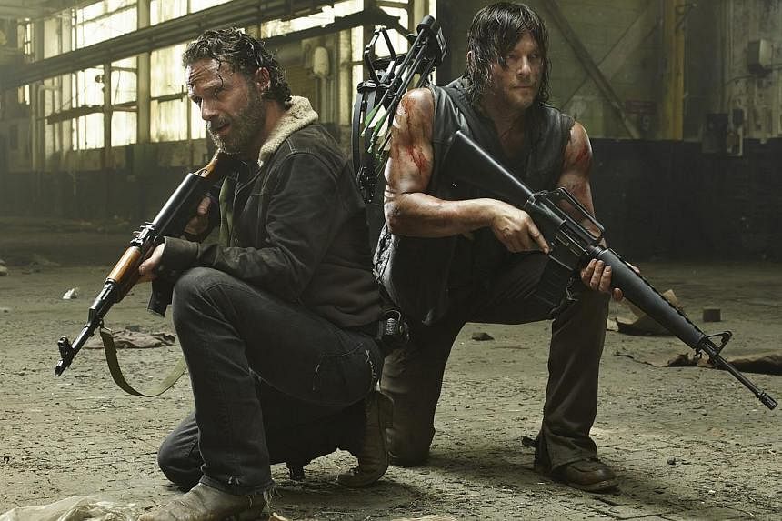 Main characters in The Walking Dead that are favourites with fans are played by Steven Yeun (left), Andrew Lincoln (above left) and Norman Reedus (above right).