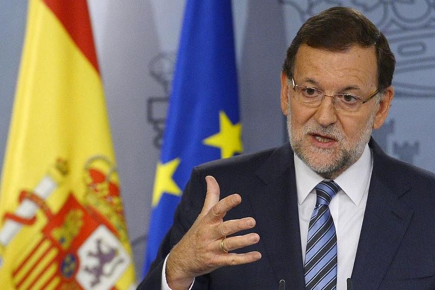 Spanish Prime Minister Mariano Rajoy speaks during a press conference after an extraordinary cabinet meeting on the Catalonia independence vote on Sept 29, 2014, at the Moncloa Palace in Madrid. Mr Rajoy on Tuesday hailed the decision by Catalan lead