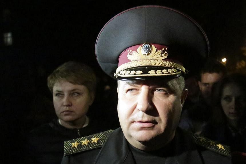 Colonel General Stepan Poltorak speaks to the media in Kiev on Oct 13, 2014. -- PHOTO: AFP
