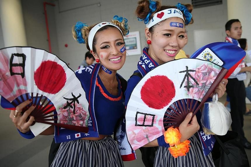 Fans of Japanese football team spotted at Brazil vs Japan soccer match at Singapore Sports Hub on Oct 14, 2014. -- ST PHOTO : WANG HUI FEN&nbsp;&nbsp;