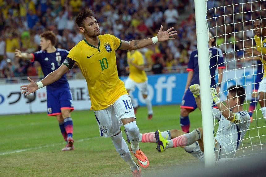 Brazil captain Neymar wheels away after scoring his fourth goal against Japan in their 4-0 friendly win at the National Stadium in the Singapore Sports Hub. The gripping victory has set international and social media abuzz, even the morning after the
