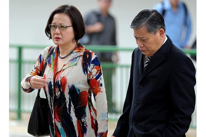 Aljunied-Hougang-Punggol East Town Council chairman Sylvia Lim and Mr Peter Low, lawyer for the town council, arriving at the State Courts on Wednesday. -- ST PHOTO: WONG KWAI CHOW