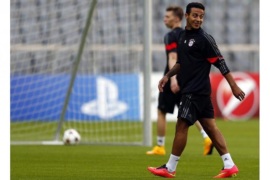 Bayern Munich's Thiago Alcantara attends a training session before their Champions League group E soccer match against Manchester City, in Munich on Sept 16, 2014. -- PHOTO: REUTERS