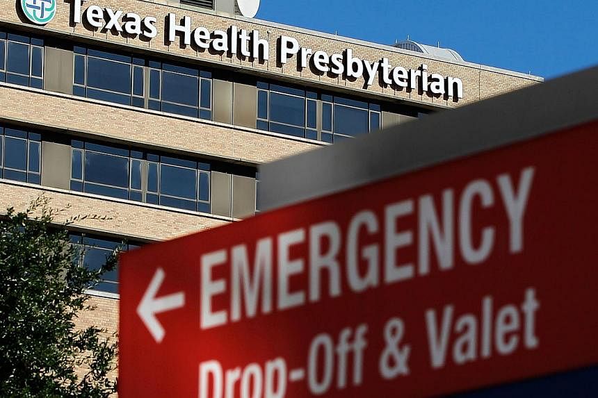 The Texas Health Presbyterian Hospital, where health care worker Nina Pham, is being treated for the Ebola virus is seen on Oct 14, 2014 in Dallas, Texas. -- PHOTO: AFP