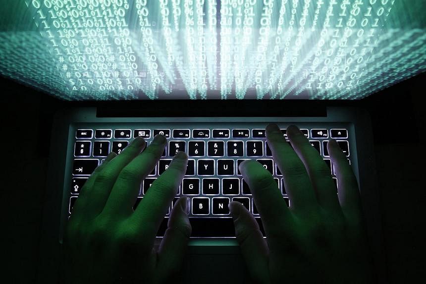 The funding, given under the NRF's national cyber security research and development programme, will help to incorporate security considerations into the design of various systems, and thus better guard against attacks. -- PHOTO: REUTERS