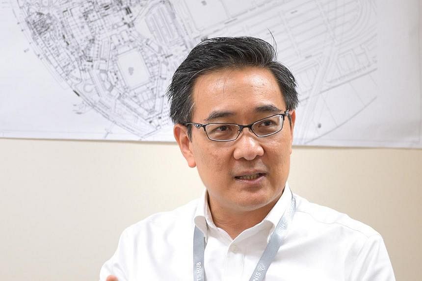 The Singapore Sports Hub has vowed to get to the root of the problem facing the National Stadium pitch and fix it, said its chief operating officer Oon Jin Teik. -- ST PHOTO: LIM SIN THAI