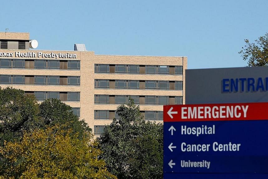 The Texas Health Presbyterian Hospital, where health care worker Nina Pham, is being treated for the Ebola virus is seen on Oct 14, 2014, in Dallas, Texas. -- PHOTO: AFP