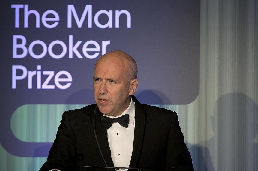 Australian author Richard Flanagan, who wrote The Narrow Road To The Deep North, speaks after winning the 2014 Man Booker Prize for Fiction at the Guildhall in London, England on Oct 14, 2014. -- PHOTO: REUTERS