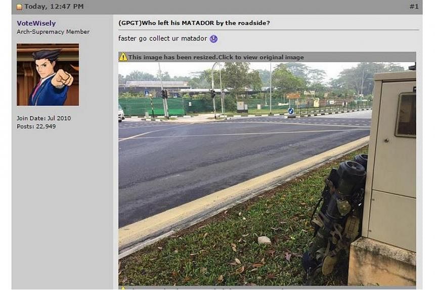 Pictures have surfaced online of what looks like a pair of anti-tank weapons placed beside a transformer box by the roadside. -- PHOTO:&nbsp;SCREENGRAB FROM HARDWAREZONE.COM.SG