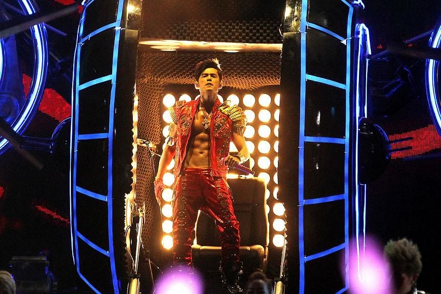 Taiwanese pop star Jay Chou's concert at the National Stadium on Nov 8 has been postponed till Dec 27 to give the much-maligned field some respite, before the Asean Football Federation (AFF) Suzuki Cup kicks off on Nov 23. -- PHOTO: ST FILE