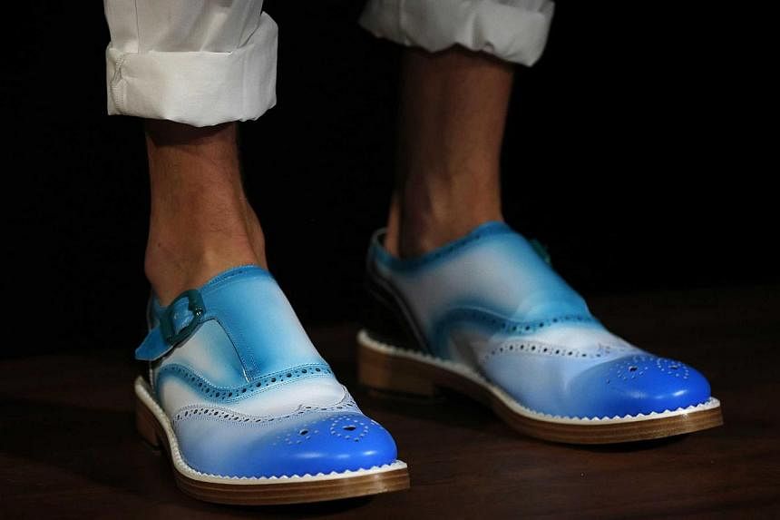A model presents a creation from Jimmy Choo during its London Collections: Men show in London in this June 16, 2014 file photo. -- PHOTO: REUTERS