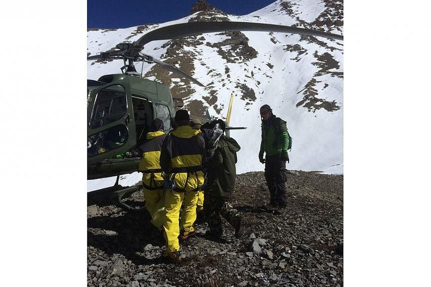 Nepal's Prime Minister has pledged to set up a weather warning system after a major Himalayan snowstorm killed 32 people at the height of the trekking season, 17 of them tourists. -- PHOTO: AFP