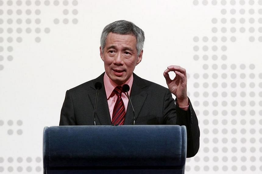 Singapore is seriously considering how it can be a helpful partner in the fight against the militant group Islamic State in Iraq and Syria (ISIS), Prime Minister Lee Hsien Loong told leaders from Asia and Europe on Friday. -- PHOTO: LIANHE ZAOBAO FIL