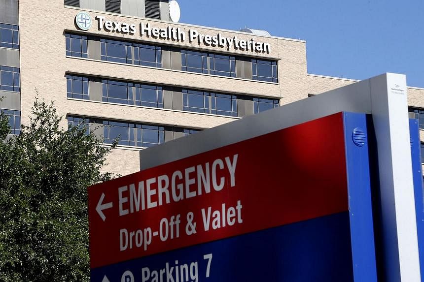 A Texas health worker who may have had contact with specimens from the first patient diagnosed with Ebola in the United States has been isolated on a cruise ship despite showing no symptoms of the disease, the Department of State said on Friday. -- P