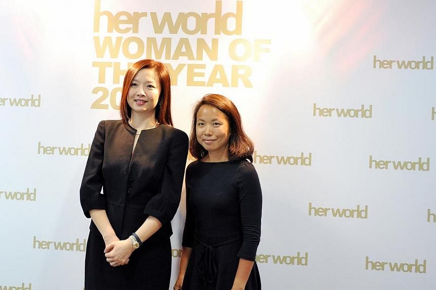 Her World Woman of The Year, lawyer Rachel Eng, 46 (left), and Her World Young Woman Achiever, photojournalist Sim Chi Yin, 35 (right). -- ST PHOTO: RUDY WONG