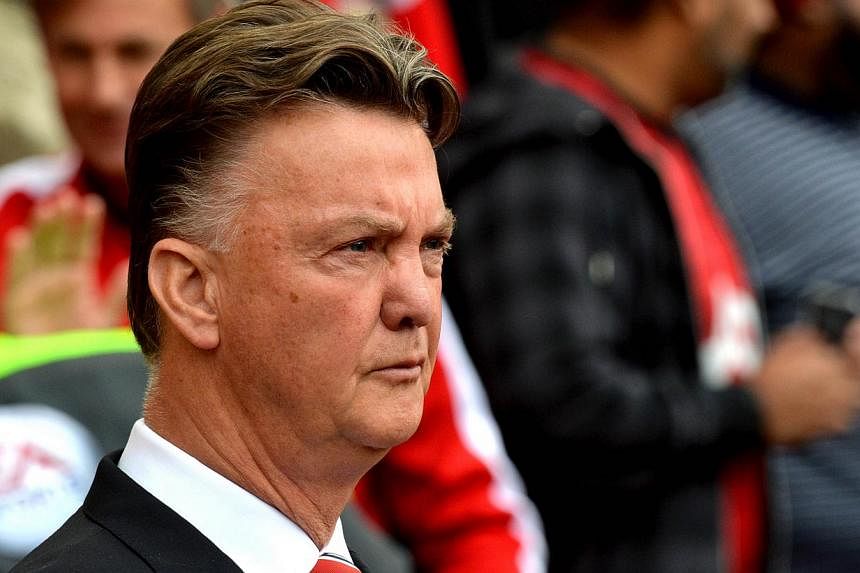 Manchester United's Dutch manager Louis van Gaal waits for the start of the English Premier League football match between Manchester United and Everton at Old Trafford in Manchester, Northwest England, on Oct 5, 2014. Van Gaal believes his players ar