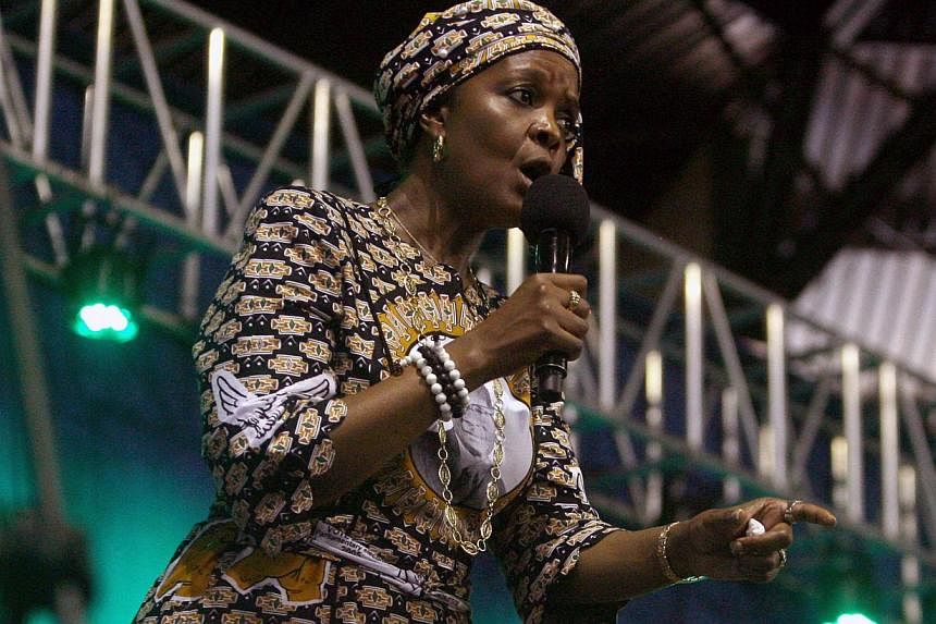 Zimbabwe's first lady Grace Mugabe speaks during a campaign meeting at the City Sports Centre in Harare, Oct 8, 2014. President Robert&nbsp;Mugabe's increasingly powerful wife Grace has threatened Zimbabwe's vice-president with expulsion from the rul