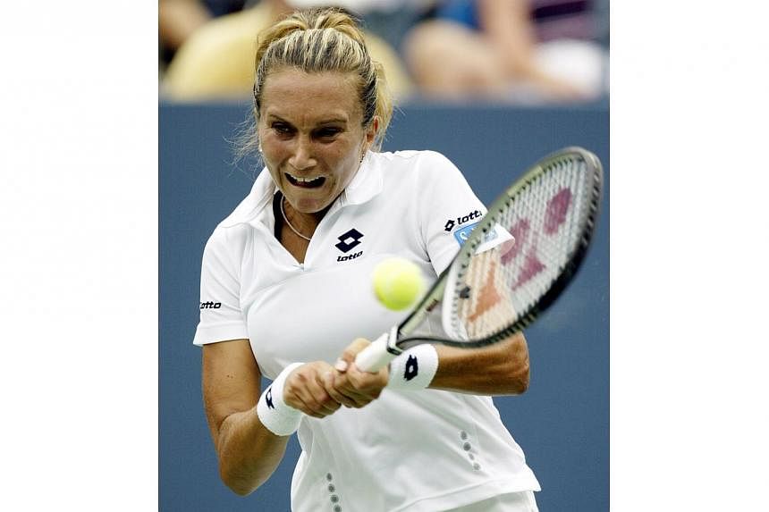 Iva Majoli of Croatia playing in the US Open in 2002. -- PHOTO: REUTERS