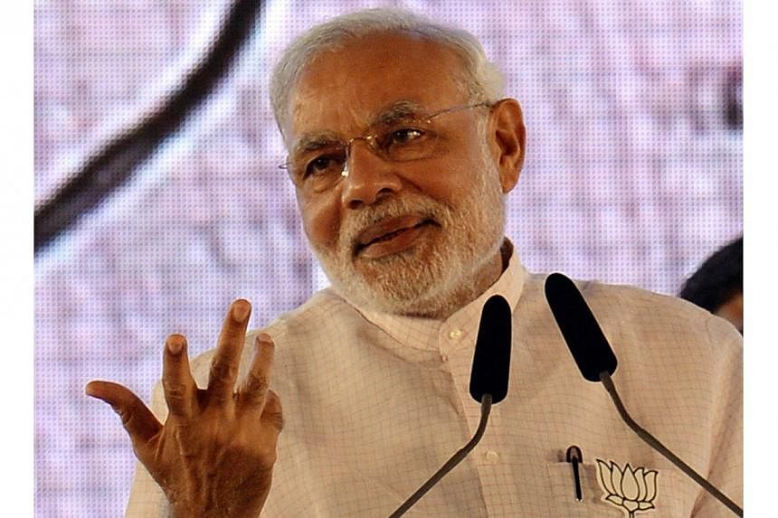 Prime Minister Narendra Modi’s Hindu nationalist party made big gains in two Indian state elections, partial results showed on Sunday, in an endorsement that will encourage him to step up the pace of economic reforms. -- PHOTO: AFP