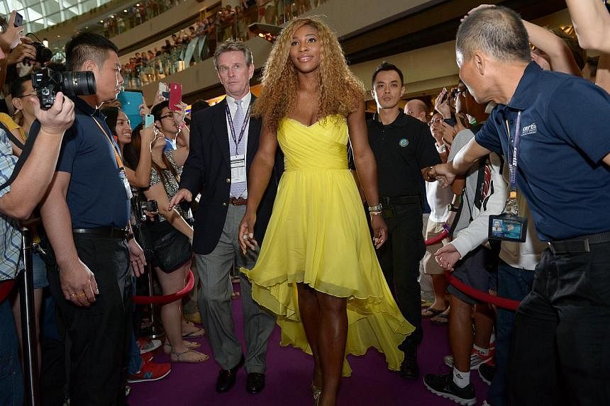 World number one Serena Williams on the red carpet at Marina Bay Sands Shoppes ice skating rink as she arrived for the WTA finals official singles draw ceremony.&nbsp;-- ST PHOTO:&nbsp;DESMOND WEE