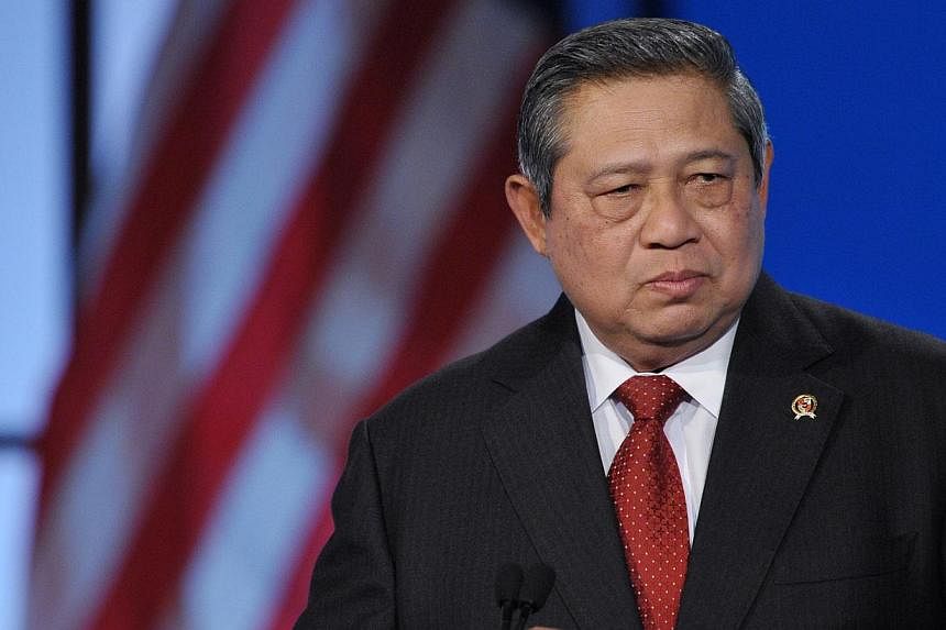 Indonesian President Susilo Bambang Yudhoyono on Sunday marked his last day in office with a message to his more than 5 million followers on Twitter, apologising for any offence he may have caused in his decade as head of state. -- PHOTO: AFP