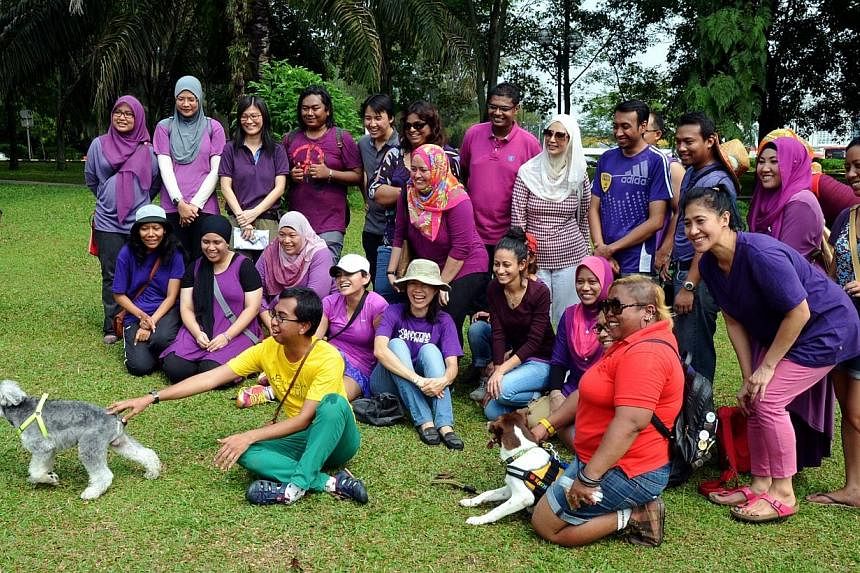 I Want To Touch A Dog day at Central Park, Bandar Utama.&nbsp;Islamic authorities in Malaysia are conducting a probe into a controversial "dog patting" event aimed at removing the stigma regarding men's best friend in the multi-ethnic Muslim-majority