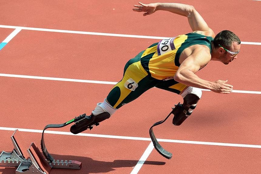 Double amputee Oscar Pistorius of South Africa sets off in the men's 400m heats at Olympic Stadium during the 2012 London Olympics. -- PHOTO: ST FILE