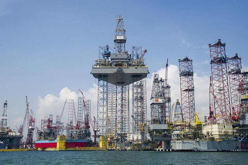 A Keppel FELS yard in Singapore.&nbsp;Property curbs in Singapore and China dragged down third quarter net profit at conglomerate Keppel Corp, which also builds oil rigs and infrastructure projects around the world. -- PHOTO:&nbsp;KEPPEL CORPORATION