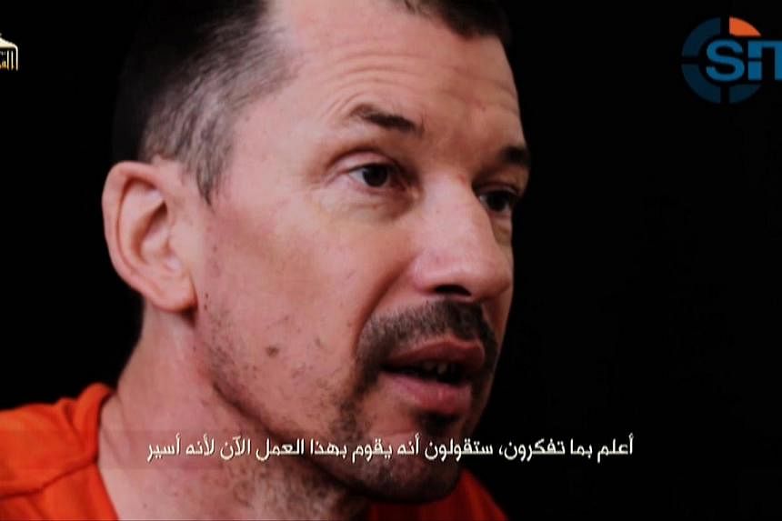 Mr Paul Cantlie, the father of British ISIS hostage John Cantlie (pictured), has died of "complications following pneumonia", his family said, according to several media sources. -- PHOTO: REUTERS