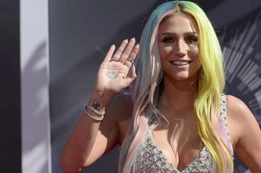 Singer Kesha arrives at the 2014 MTV Music Video Awards in Inglewood, California on August 24, 2014. -- PHOTO: REUTERS
