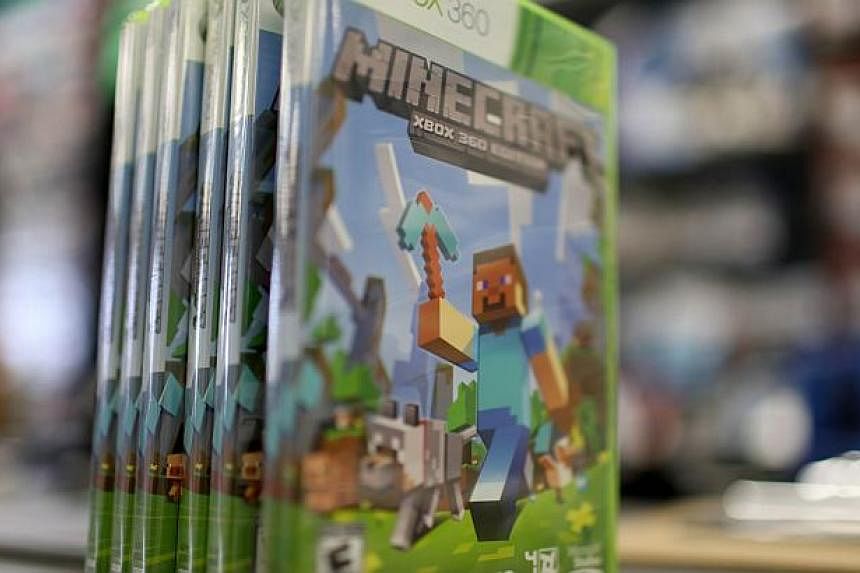 An XBox 360 Minecraft game is seen at a GameStop store on Sept 15, 2014 in Miami, Florida. -- PHOTO: AFP