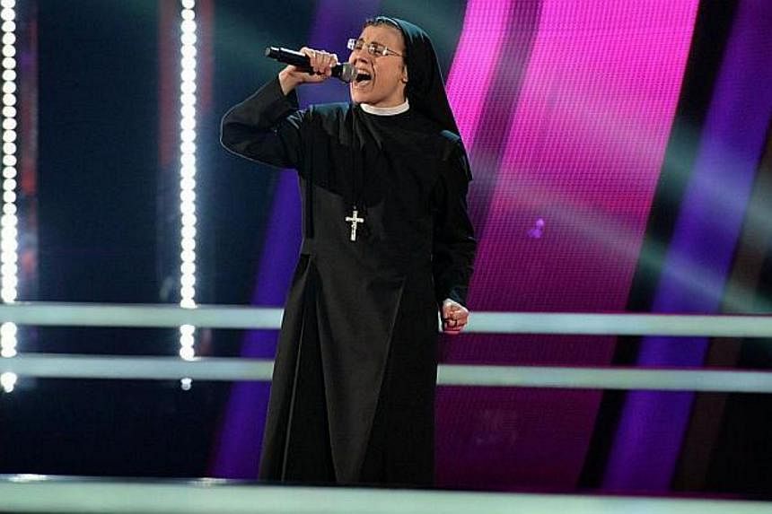 Sister Cristina Scuccia performing during the The Voice Of Italy competition in June, in Milan. -- PHOTO: AFP&nbsp;