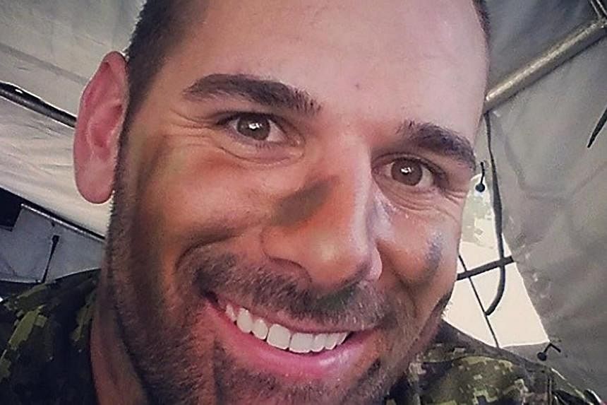The Canadian soldier who was shot dead by a gunman while guarding the National War Memorial in Ottawa has been identified as Corporal Nathan Cirillo, a 24-year-old reservist from Hamilton, Ontario, with a young son.&nbsp;-- PHOTO:&nbsp;NATHAN CIRILLO