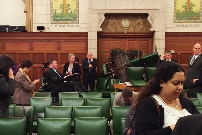The Conservative Party caucus room is shown shortly after shooting began on Parliament Hill, in Ottawa, Ontario on Oct 22, 2014. Photo taken and provided by MP Nina Grewal. -- PHOTO: REUTERS
