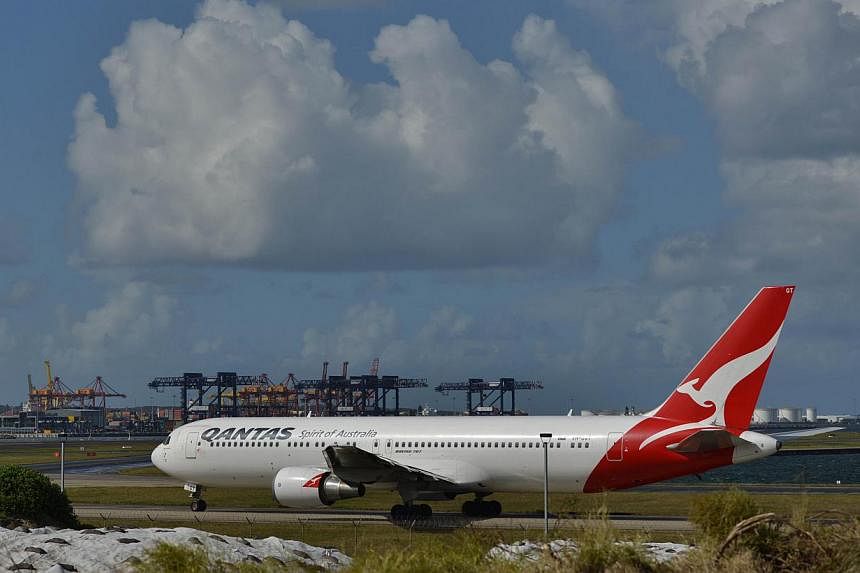 Qantas Airways said on Friday it had returned to underlying profitability in the first three months of the financial year. -- PHOTO: AFP