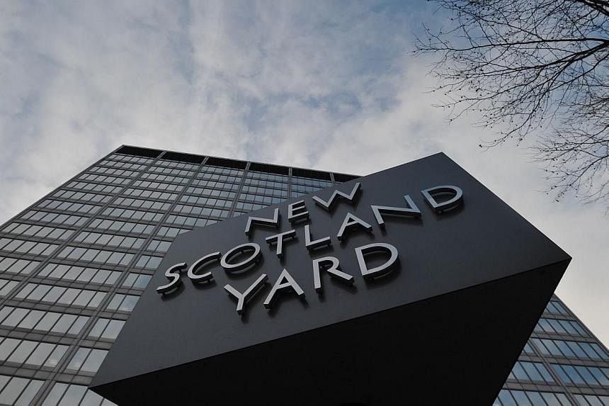 New Scotland Yard, the headquarters of the Metropolitan Police, in central London. British police are to pay £425,000 (S$867,697) compensation to a woman who had a child with a man she did not know was an undercover agent, reports said. -- PHOTO: AF