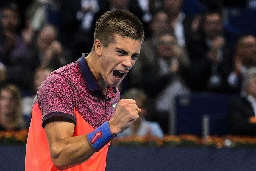 Borna Coric of Croatia reacts after a winning point during his match against Rafael Nadal of Spain at the Swiss Indoors ATP 500 tennis tournament in Basel&nbsp;on Oct 24, 2014. -- PHOTO: AFP