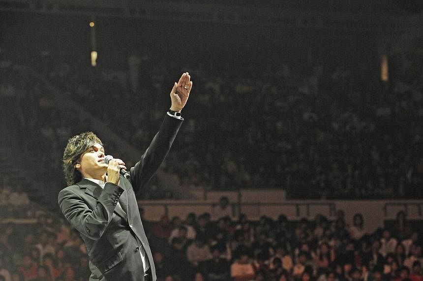 Pastor Joseph Prince's signature animated and dramatic style of preaching has won him fans and legions of followers at the church he founded, New Creation Church. He is preaching here at Singapore Indoor Stadium on Sep 28 to a full house. The church,