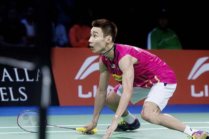 Lee Chong Wei of Malaysia competes against Viktor Axelsen of Denmark during their men's singles semi-final match at the Badminton World Championships in Copenhagen on Aug 30, 2014. Malaysian badminton officials expressed "shock" on Sunday in their fi